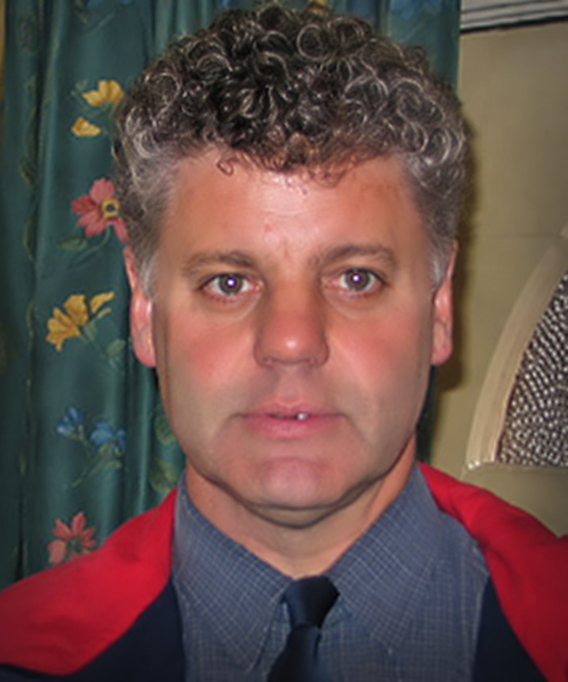 Bobs-portrait-with-a-lighter-backdrop.png
